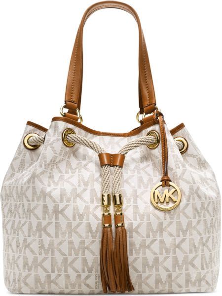 michael kors marina jet set tote vanilla product description|Michael Kors jet set pouch.